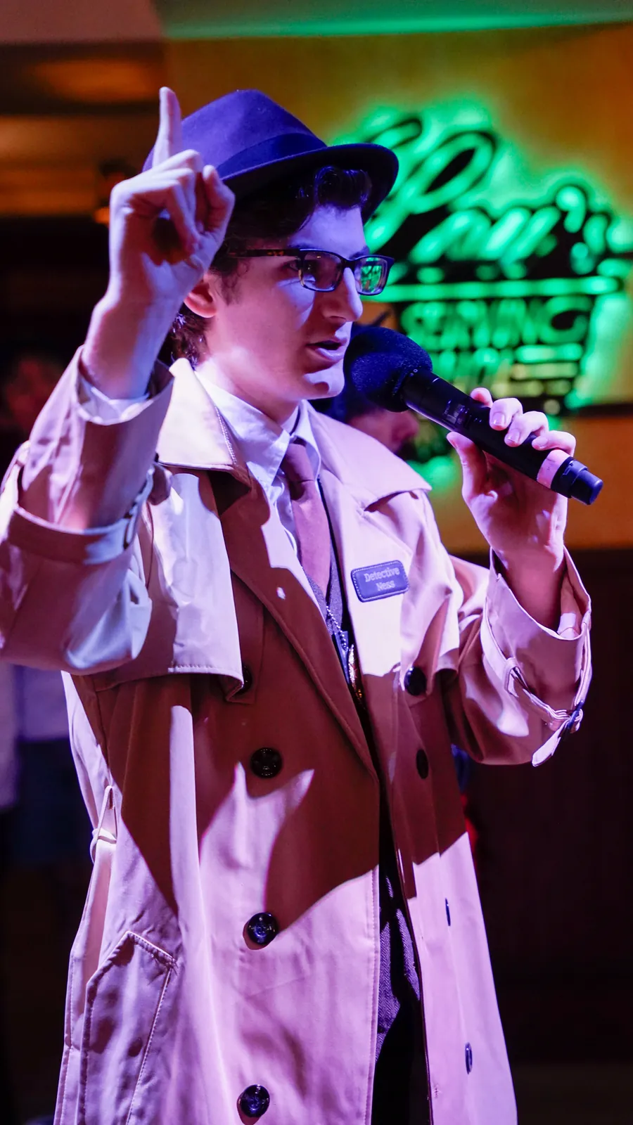 A Murder Mystery Company actor working the room at a Cleveland show